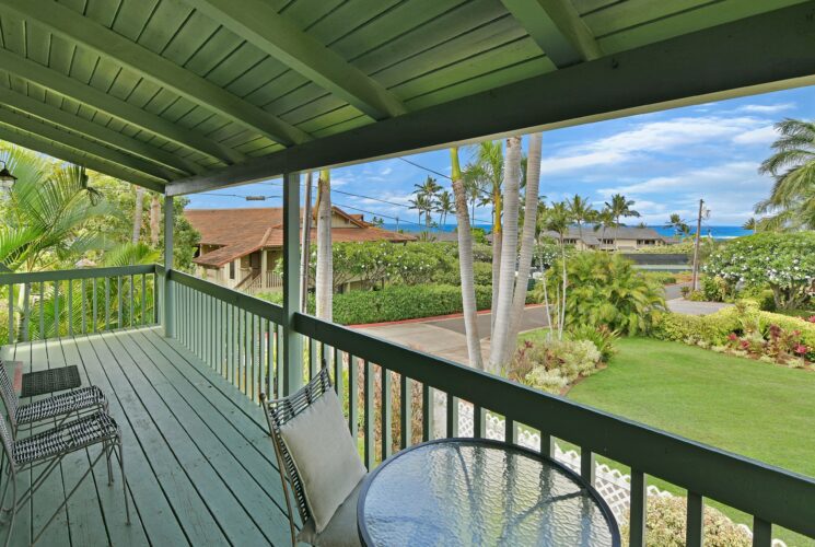 Outside lanai view of green grass courtyard.