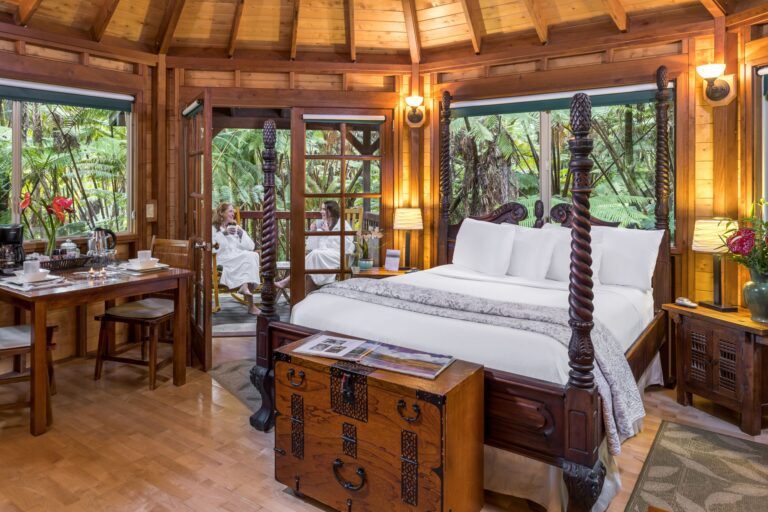Room at a Village lodge with artsy wood furnishings.