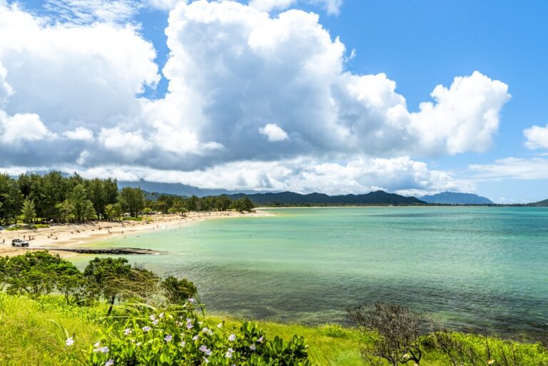 White sand beach and turquoise bay at Kailua Beach Park on a cloudy day