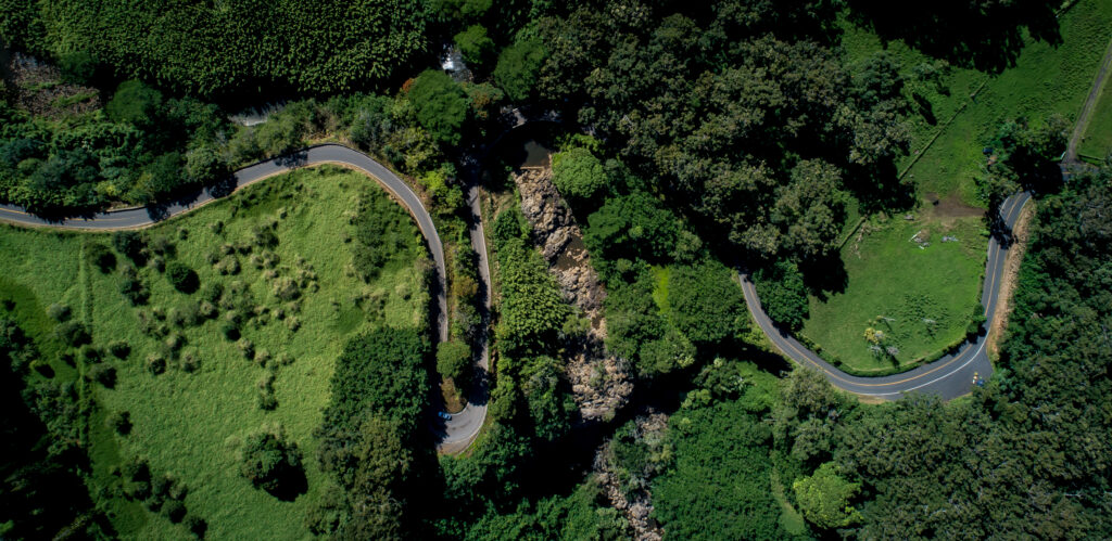 Aerial image of winding mountain road.